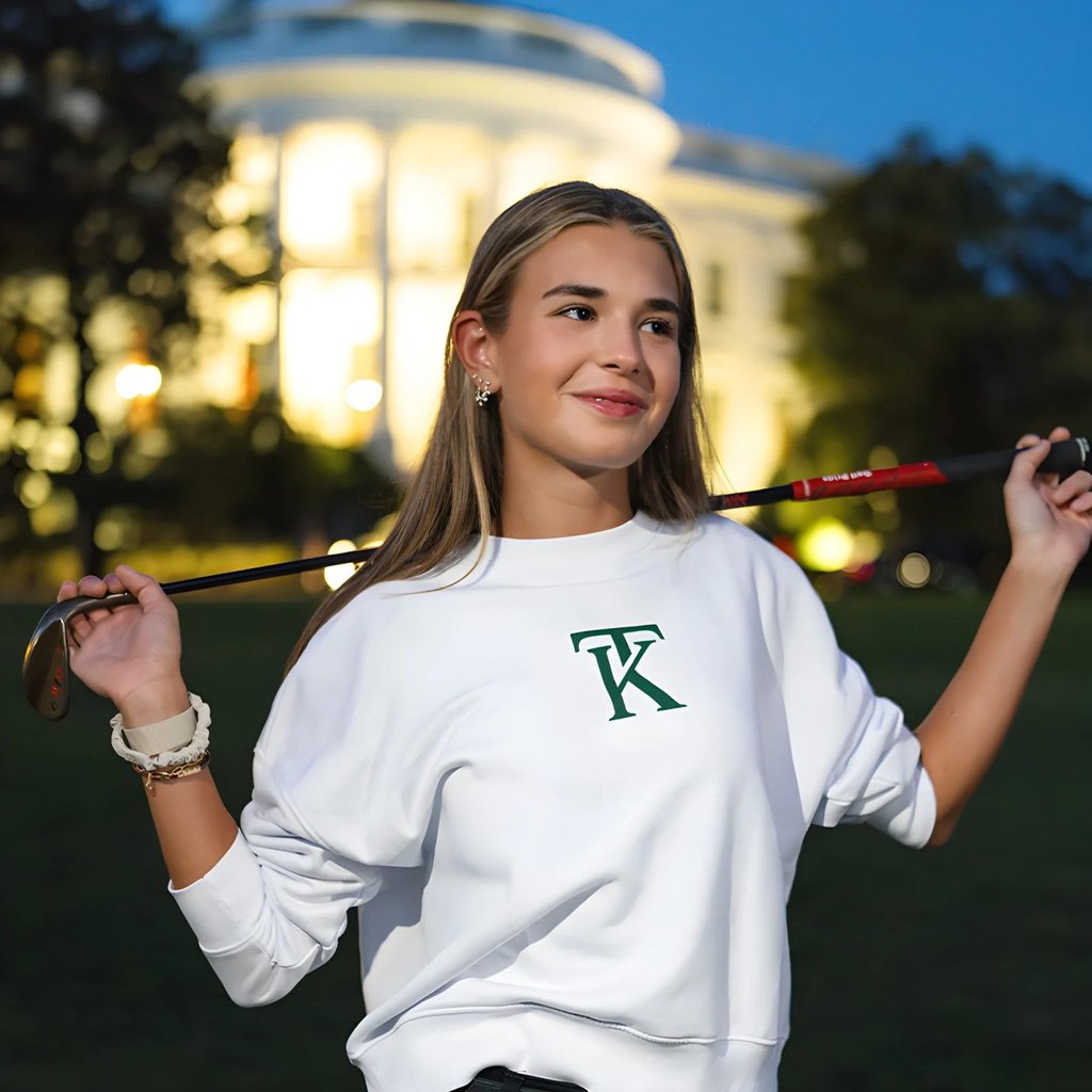 Kai Trump models one of her sweatshirts outside the White House. Photo: Kai Trump