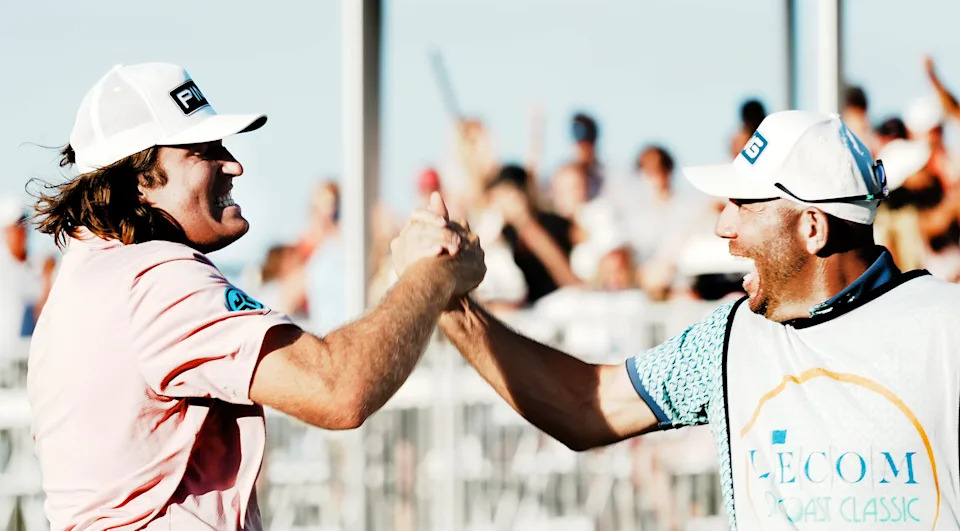 Neal Shipley celebrates with his caddie Greg Dyne after sinking a 38-ft putt during the fifth playoff hole to win the LECOM Suncoast Classic on April 19.