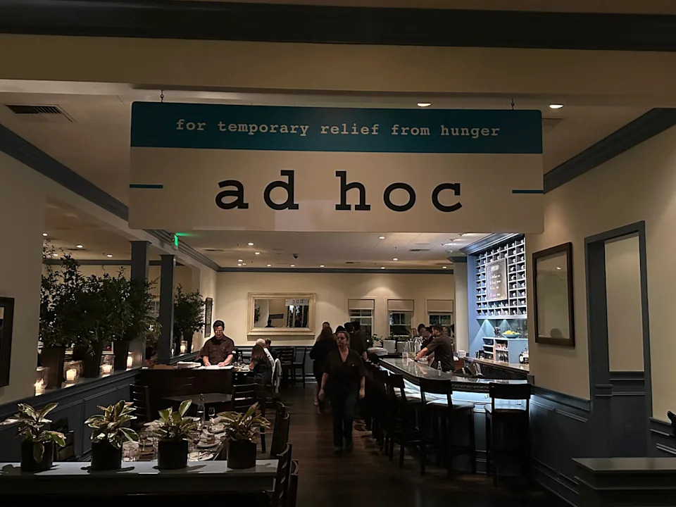 The concept for Ad Hoc is simple: a comfortable place for the Napa Valley community and families to dine. Five days a week the Yountville restaurant offers a daily-changing four-course family-style menu, curated wine list, and classic cocktails.