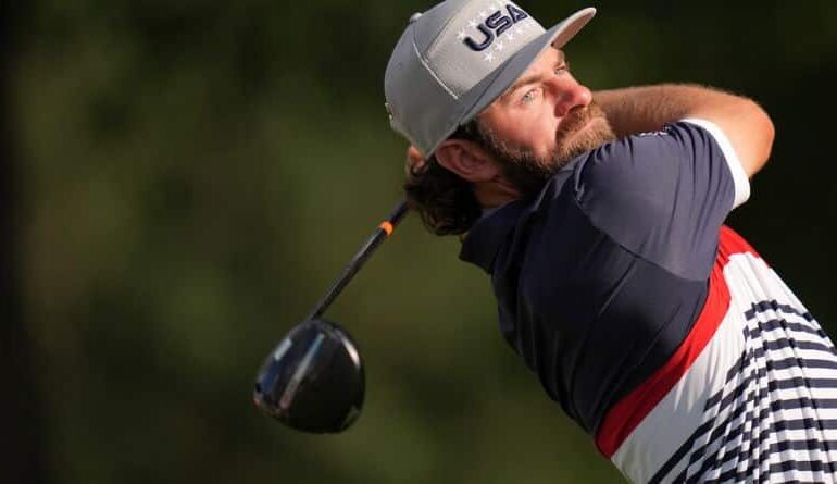 United States' Cameron Young watches his tee shot on the 12th hole at Bethpage Black golf course during the Ryder Cup golf tournament, Friday, Sept. 26, 2025, in Farmingdale, N.Y. (AP Photo/Seth Wenig)