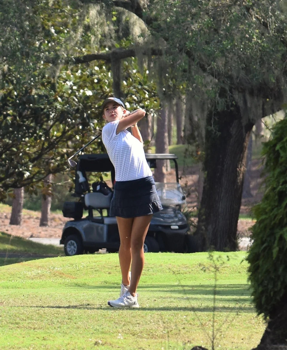 Kai Trump, Benjamin golfer and granddaughter of President-elect Donald Trump, drives the ball on Hole 11 of the Class 1A state championship on Nov. 12, 2024.