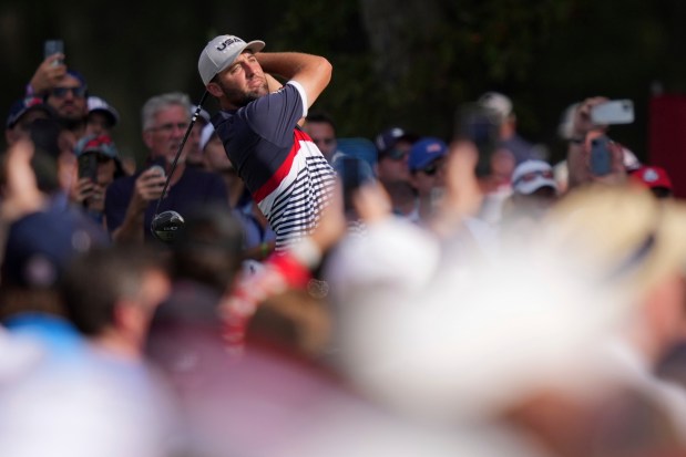 The United States' Scottie Scheffler watches his tee shot on the 12th hole Friday during the Ryder Cup at Bethpage Black in Farmingdale, New York. (Matt Slocum - ASSOCIATED PRESS)