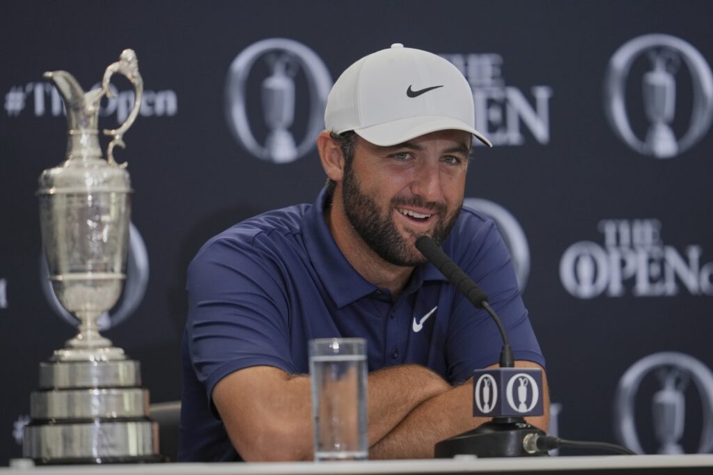 British Open champion Scottie Scheffler says comparisons to Tiger Woods ‘a bit silly’