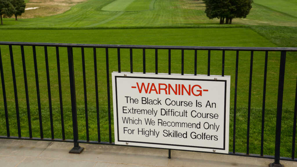 The warning sign at Bethpage Black