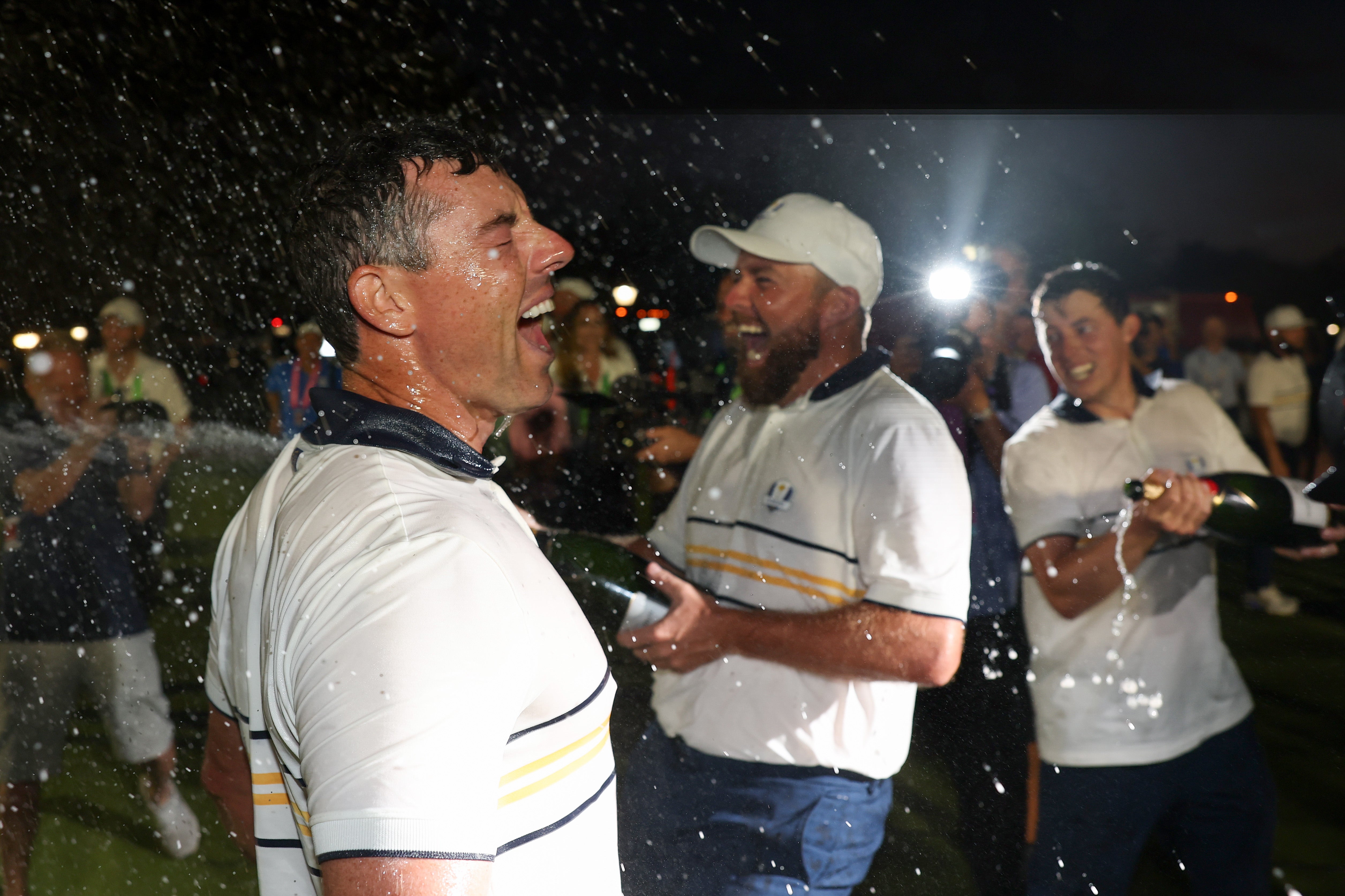 Rory McIlroy is soaked in champagne as Europe celebrate the Ryder Cup