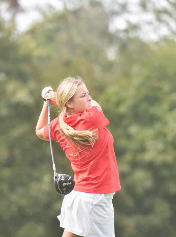 Hazleton Area’s Madison Mateo follows through with her drive at...