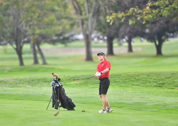 Honesdale’s Reed Howell follows through with his swing on the...