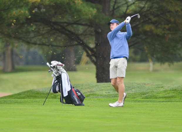 Lakeland’s Chase Rosenkrans swings from the fairway on the second...