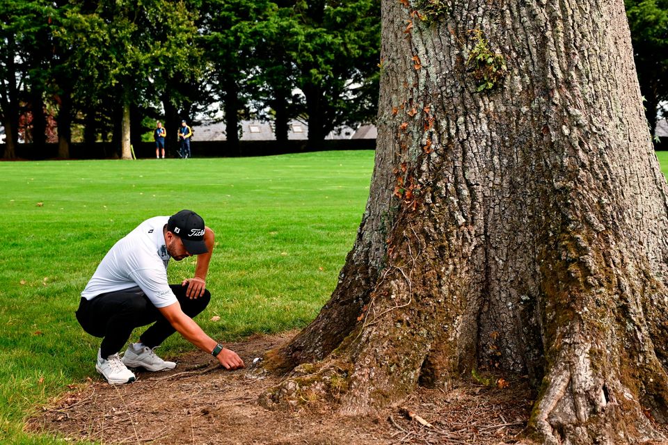 Irish golfer Alex Maguire checks his lie on the 10th fairway during day two of the Amgen Irish Open Golf Championship 2025 at The K Club in Straffan, Kildare. Photo by Ramsey Cardy/Sportsfile