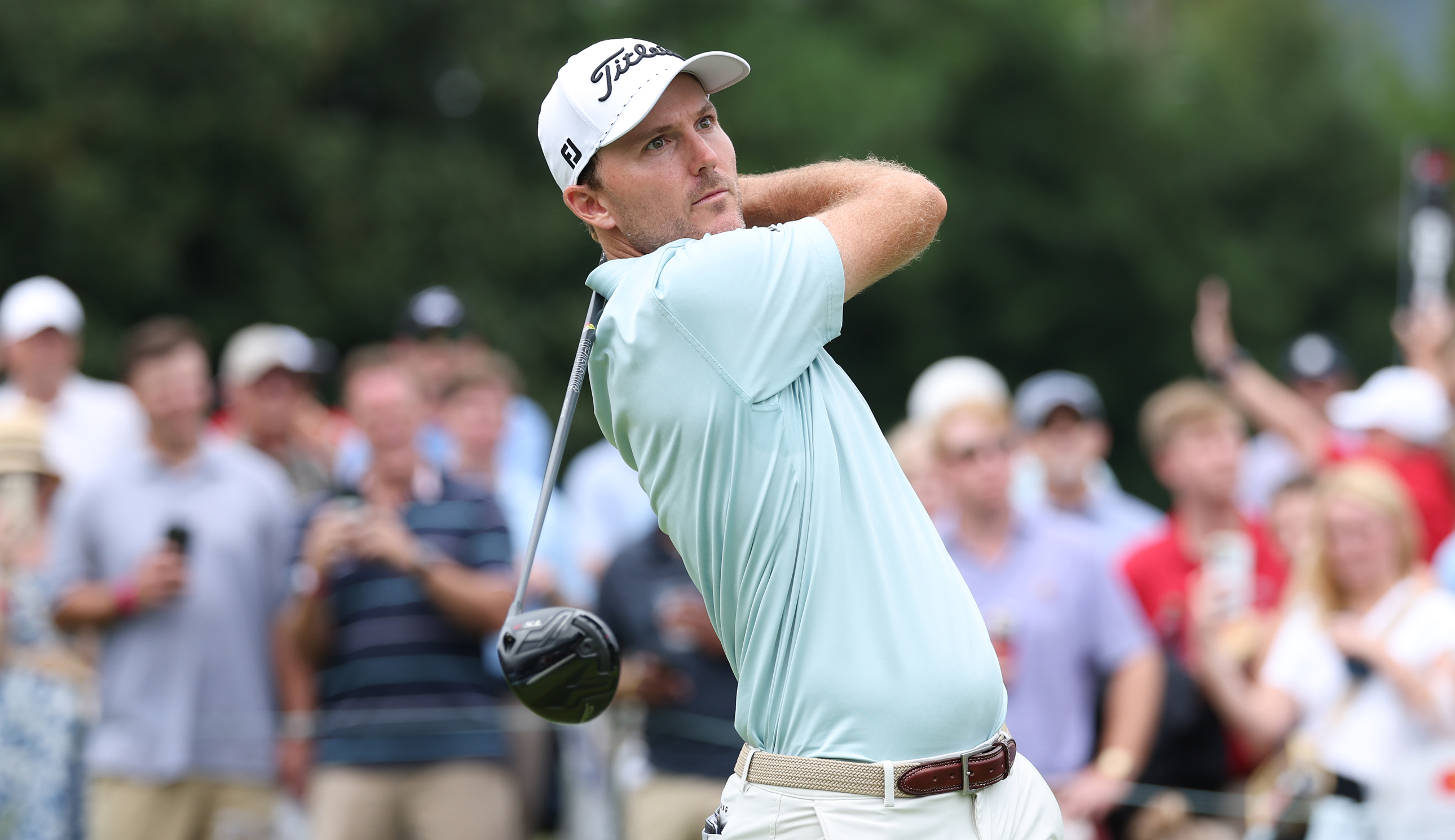 Russell Henley hits a driver