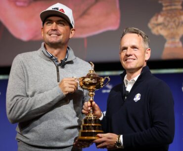 United States captain Keegan Bradley (left) and Europe captain Luke Donald (right) posed for a photo with the Ryder Cup in October 2024.