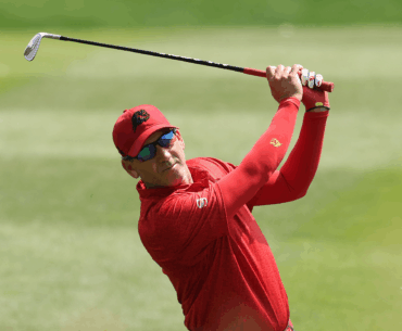 Sergio Garcia hits an iron shot from the fairway