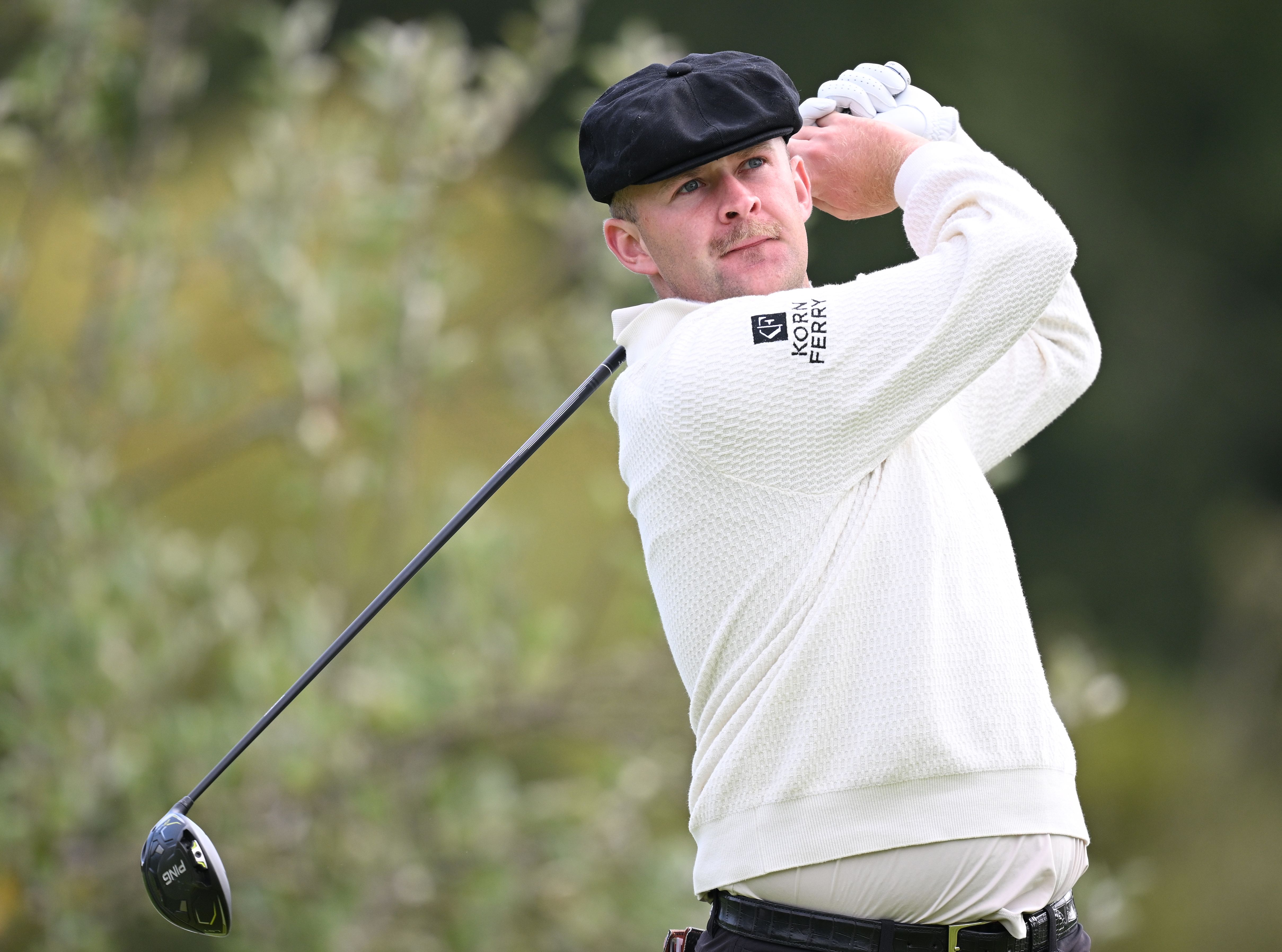 Harry Hall hits a driver off the tee