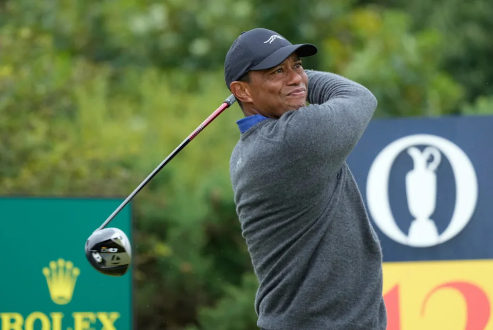 Tiger Woods hits his tee shot on the 12th hole during the first round of the 2024 Open Championship.© Jack Gruber-USA TODAY Sports
