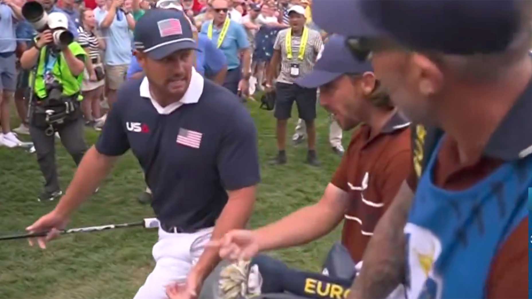 Bryson DeChambeau talks to Tommy Fleetwood during Day 2 of the Ryder Cup.