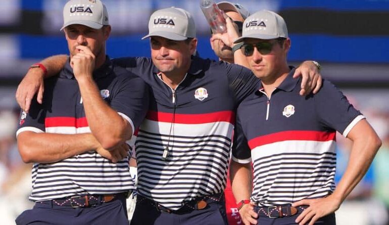 United States captain Keegan Bradley, middle, stands with Bryson DeChambeau and Ben Griffin on the 12th hole at Bethpage Black golf course during the Ryder Cup golf tournament, Friday, Sept. 26, 2025, in Farmingdale, N.Y. (AP Photo/Lindsey Wasson)