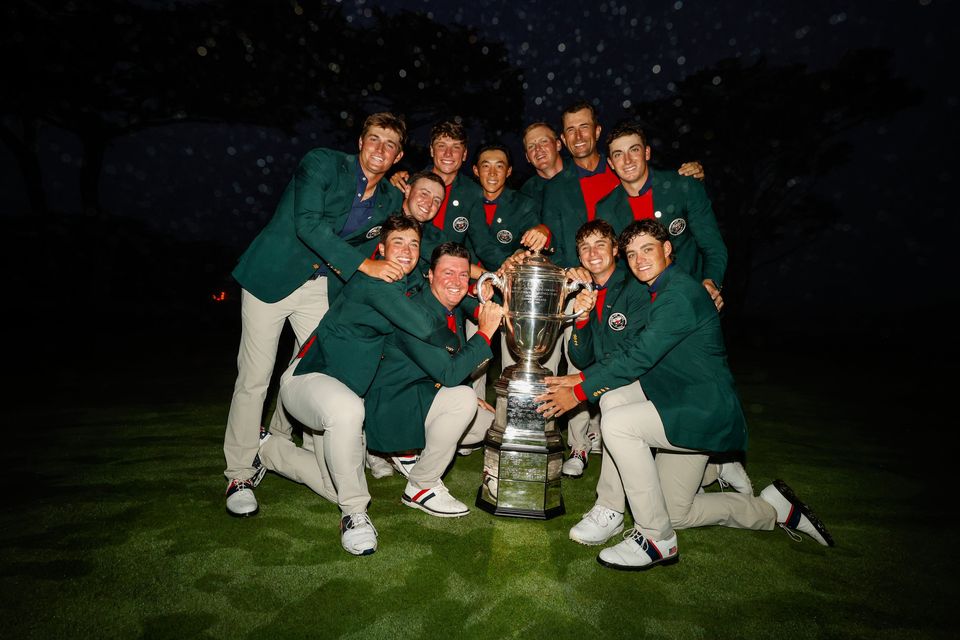The USA Team poses with the trophy during the closing ceremony of the 2025 Walker Cup at Cypress Point Club in Pebble Beach, Calif. on Sunday, Sept. 7, 2025. (Chris Keane/USGA)