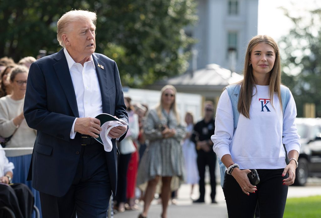 U.S. President Donald Trump, joined by his granddaughter Kai Trump, departs the White House on September 26, 2025 in Washington, DC