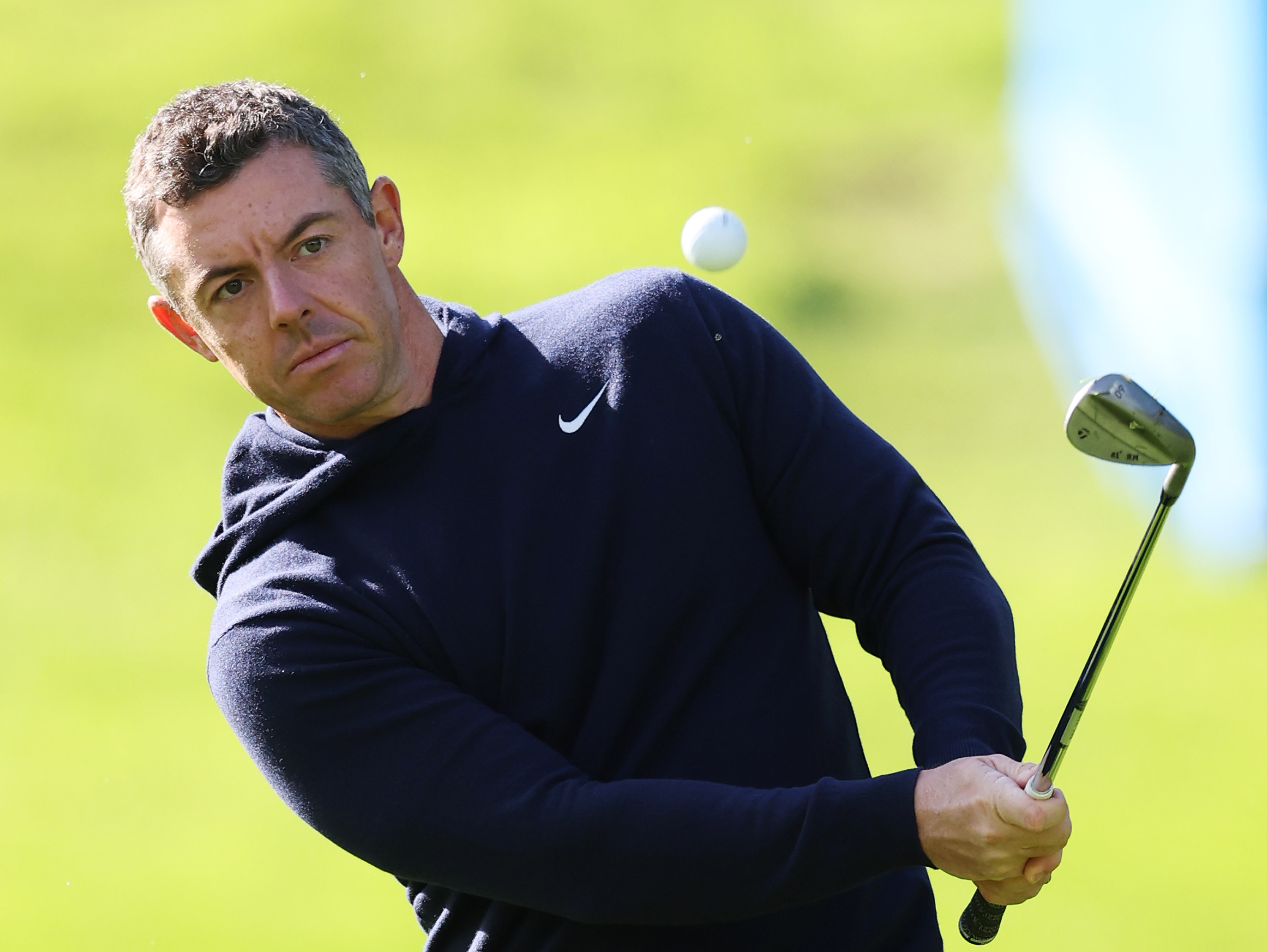 Rory McIlroy hits a wedge shot