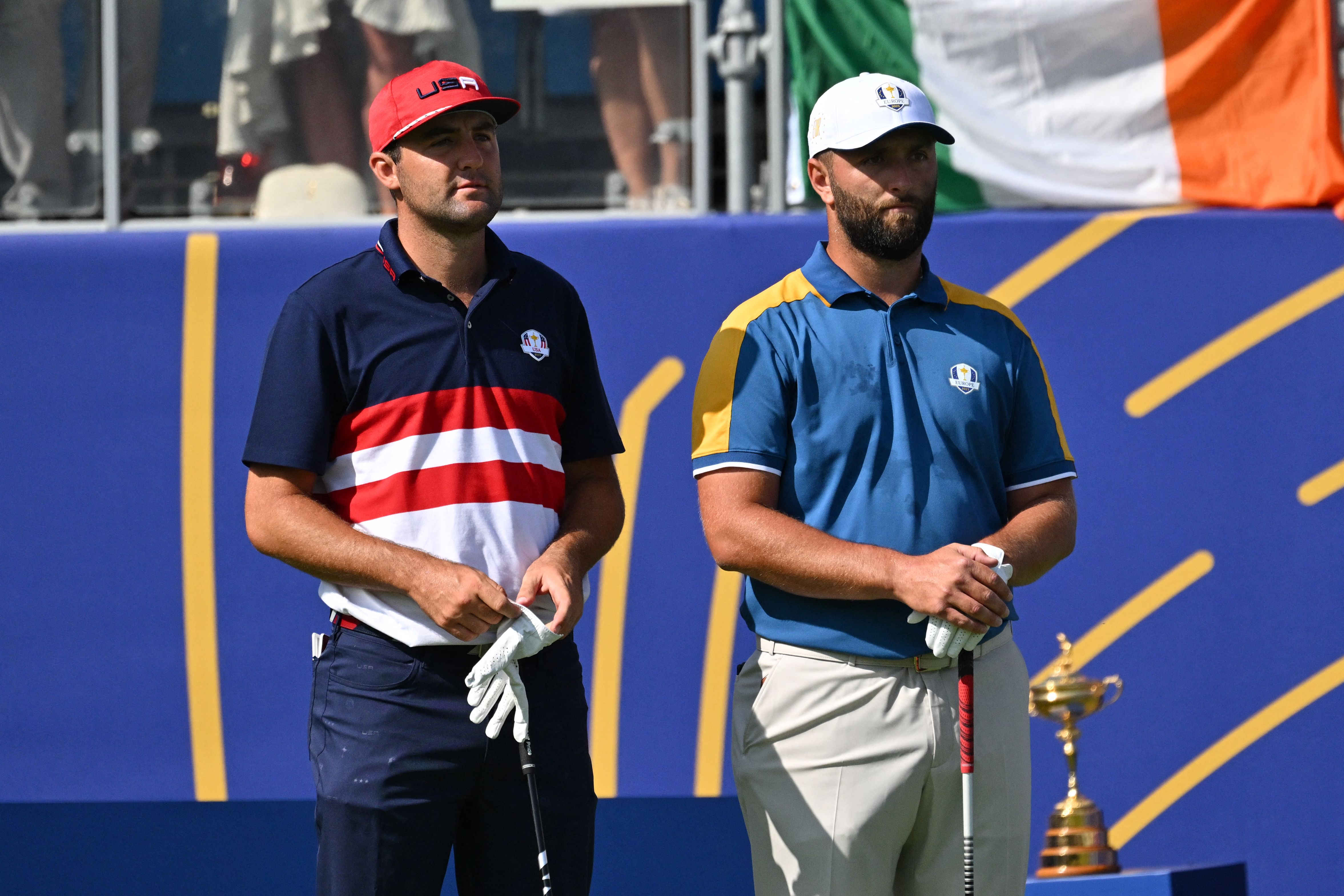 Scottie Scheffler and Jon Rahm wait on the first tee at the 2023 Ryder Cup