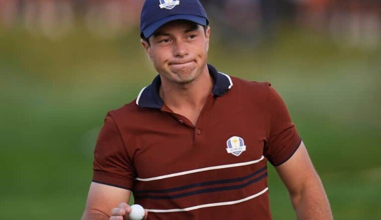 Europe's Viktor Hovland waves after making a putt on the second hole at Bethpage Black golf course during the Ryder Cup golf tournament, Saturday, Sept. 27, 2025, in Farmingdale, N.Y. (AP Photo/Seth Wenig)