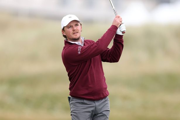 Eddie Pepperell of England plays his second shot on the second hole on day one of the Alfred Dunhill Links Championship