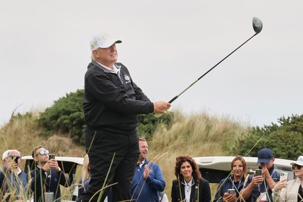 A photo of Donald Trump playing golf 