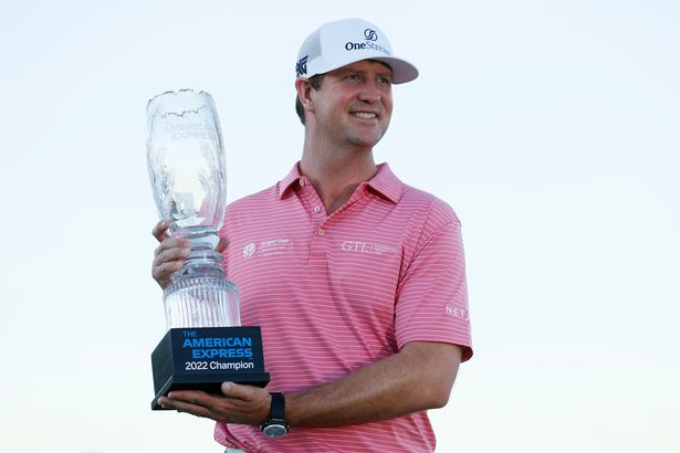 Hudson Swafford with The American Express trophy