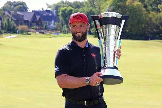 Jon Rahm with the LIV golf season individual trophy