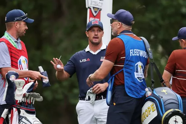 Ian Finnis talks to Bryson DeChambeau at the Ryder Cup