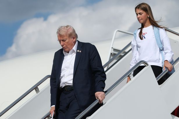 U.S. President Donald Trump and his granddaughter, Kai Trump