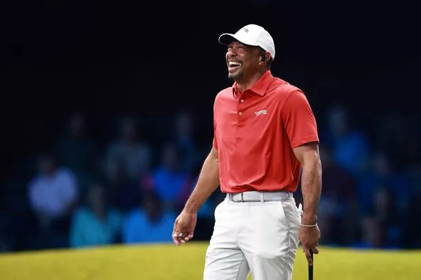 Tiger Woods of Jupiter Links Golf Club laughs during their TGL presented by SoFi match against the Atlanta Drive GC at SoFi Center on March 04, 2025 in Palm Beach Gardens, Florida.
