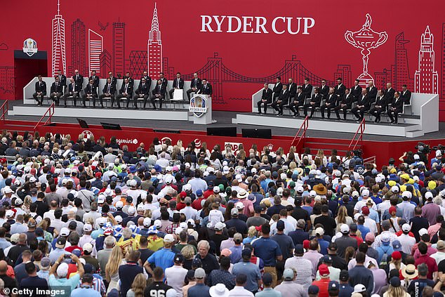 Captain Keegan Bradley of Team USA stands on stage in Long Island, New York