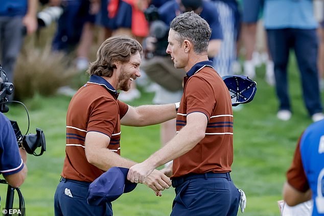 Fleetwood (left) and Rose went on to beat DeChambeau and Scottie Scheffler in fourballs, keeping their composure after the heated row to win what proved a vital point for Team Europe