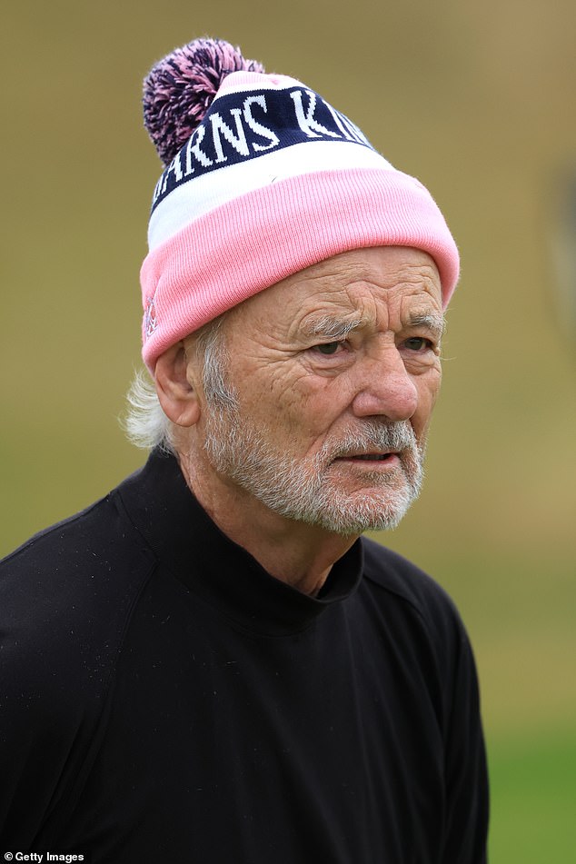 He added a pink beanie hat to keep warm
