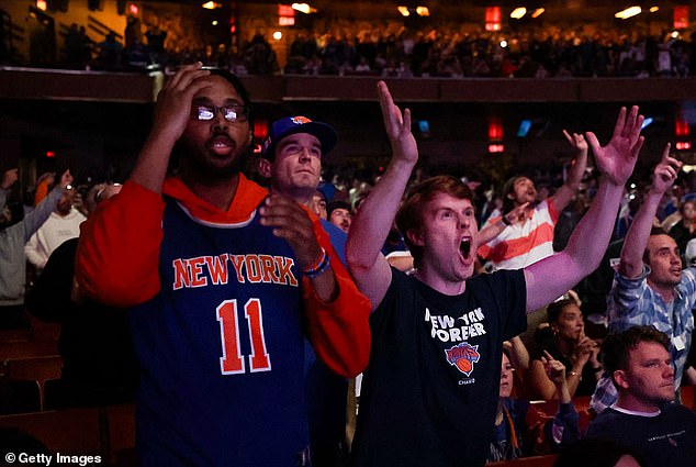 Knicks fans furiously react to a play in the Eastern Conference Finals against Indiana Pacers