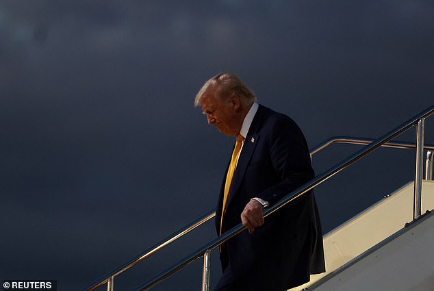 President Donald Trump disembarks Air Force One in Tokyo, Japan Monday evening