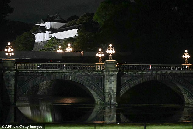 The Imperial Palace is captured from President Donald Trump's motorcade after he arrived Monday evening in Tokyo, Japan. Trump's first meeting was with the Emperor of Japan