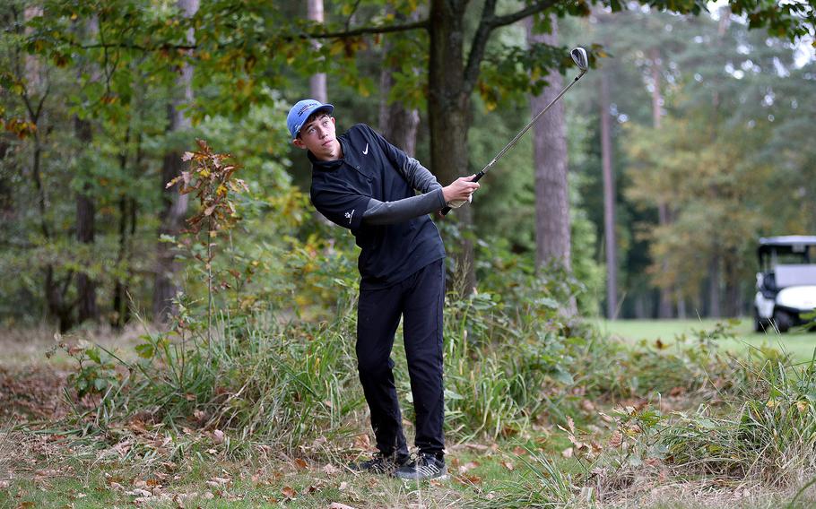 Nolan Schmidt watches his shot out of the woods.