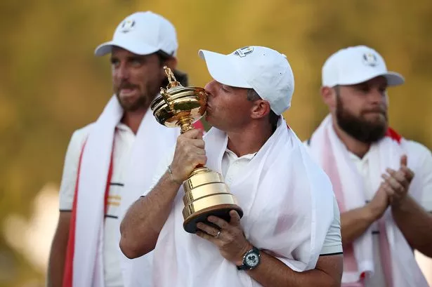 Rory McIlroy kisses the Ryder Cup