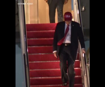 Trump descending Air Force One after arriving from Mar-a-Lago home and golfing trip