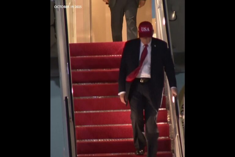 Trump descending Air Force One after arriving from Mar-a-Lago home and golfing trip Trump descending Air Force One after arriving from Mar-a-Lago home and golfing trip