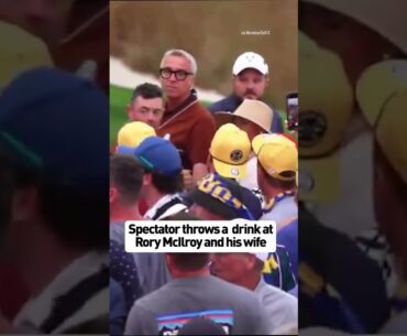 Rory and his wife Erica react to a beverage being thrown at them on Saturday at the Ryder Cup Rory and his wife Erica react to a beverage being thrown at them on Saturday at the Ryder Cup