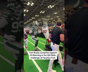 Tom Brady competes against Eli Manning at Fanatics Fest during the QB Skills Challenge