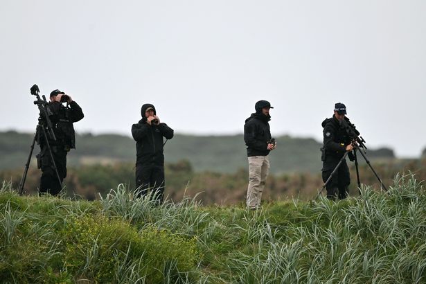 Snipers and security personnel inspect the area before US President Donald Trump he plays golf at the Trump Turnberry Golf Courses
