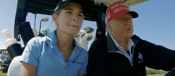 Kai Trump and Donald Trump in a golf cart