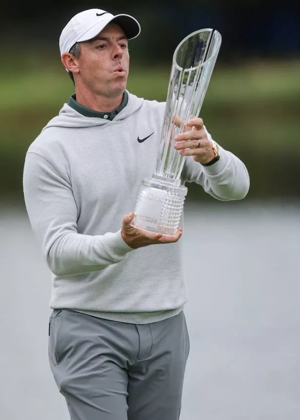 Rory McIlroy celebrates with the Amgen Irish Open trophy