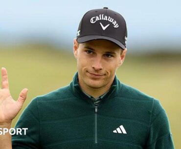Matthew Jordan raises his hand to acknowledge the crowd at the Dunhill Links Championship