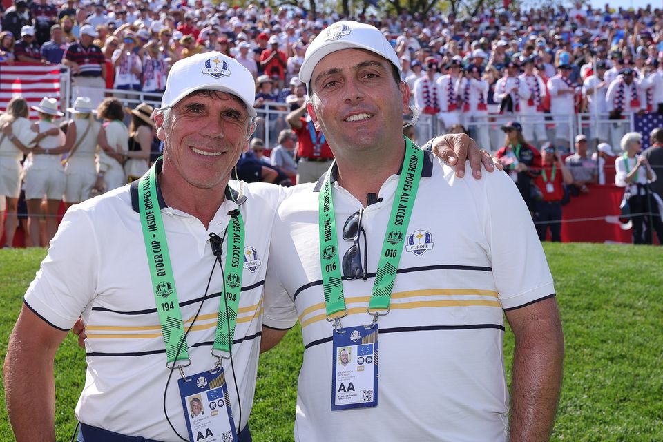 Francesco Molinari of Team Europe (right) with Gianfranco Zola, who was his driver at the Ryder Cup