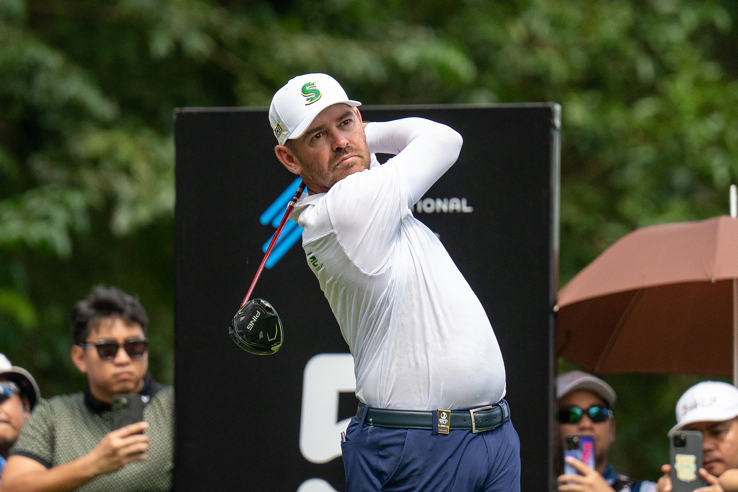 Louis Oosthuizen holds his finish on a drive